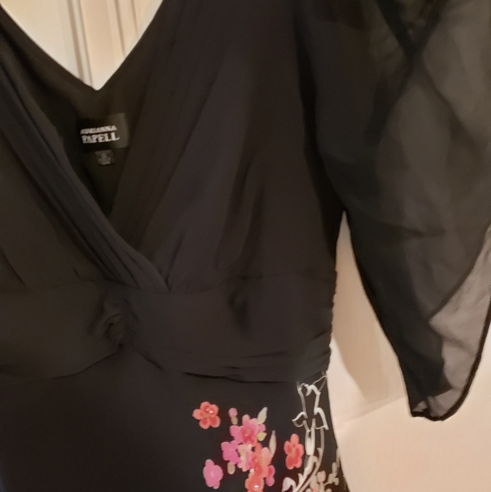 This beautiful dress I wear just one time it's in